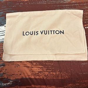 Louis Vuttion dust bag can fit small slides or purse